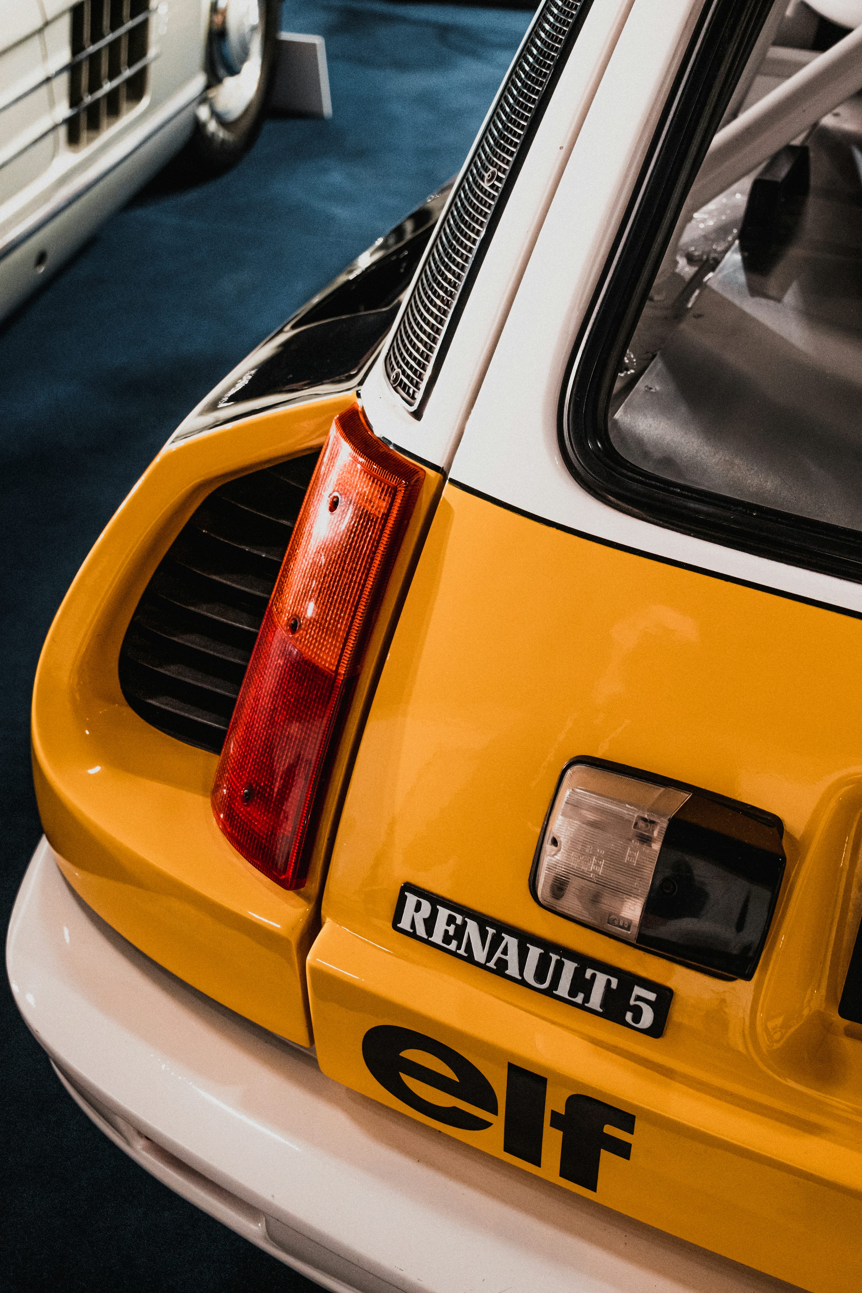 yellow and black car on road during daytime