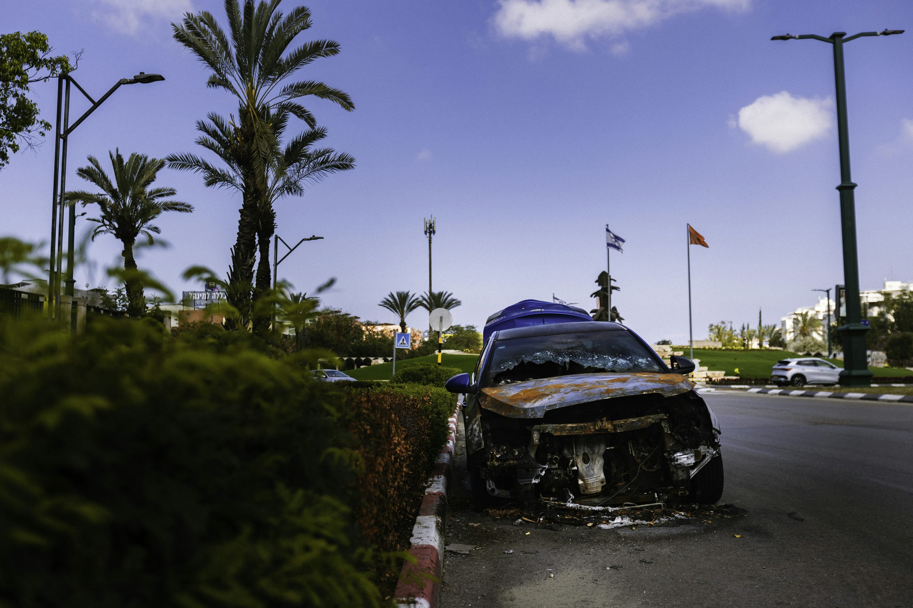 A car that is sitting in the street