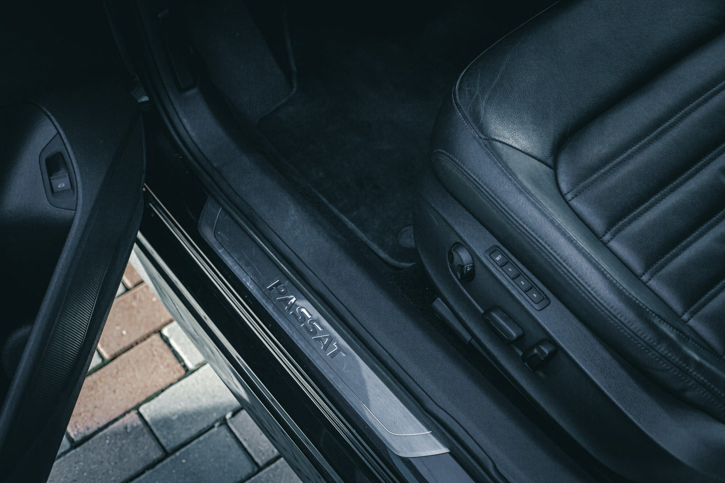 a pair of black luggage sitting on top of a floor