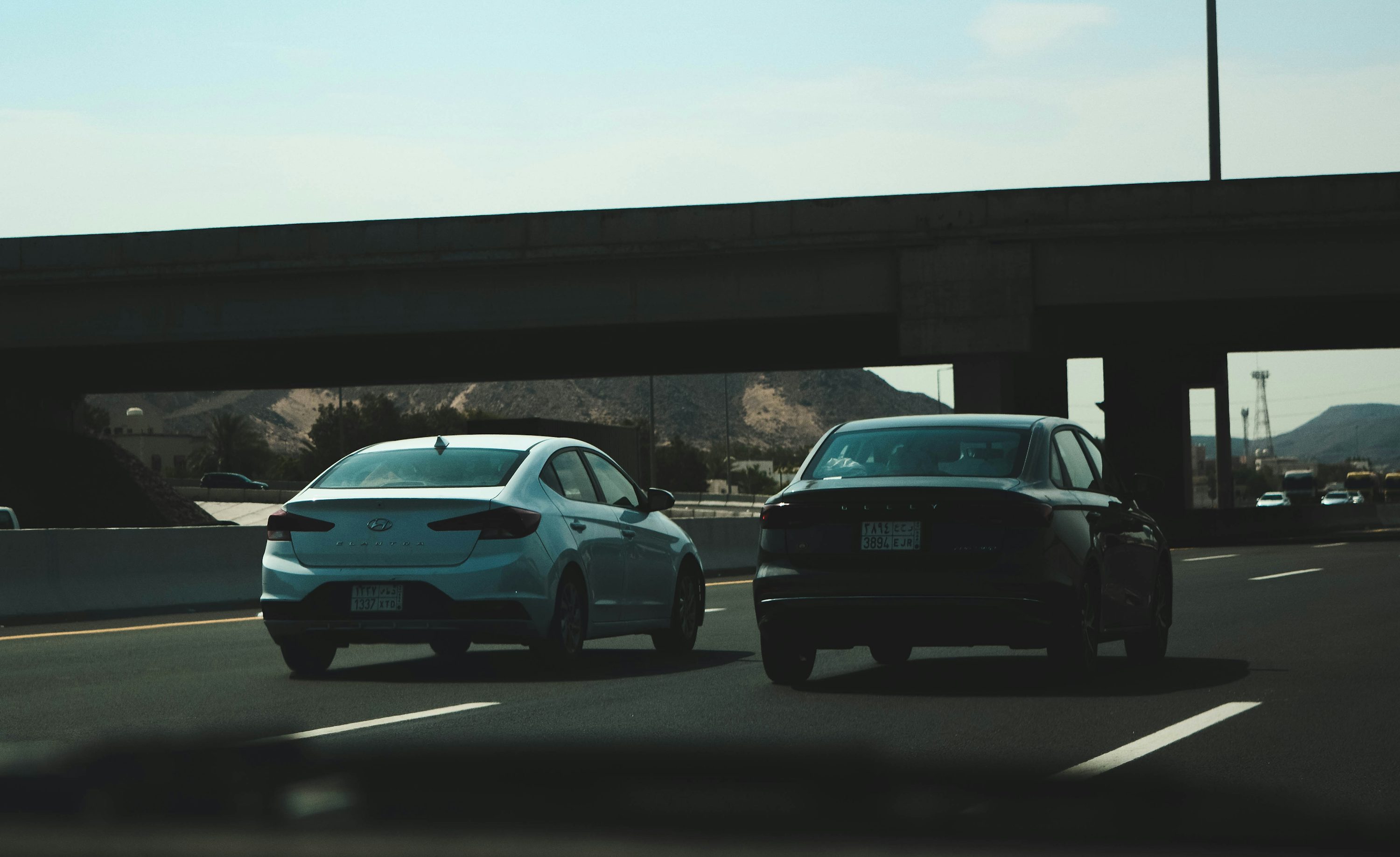 two cars on a road