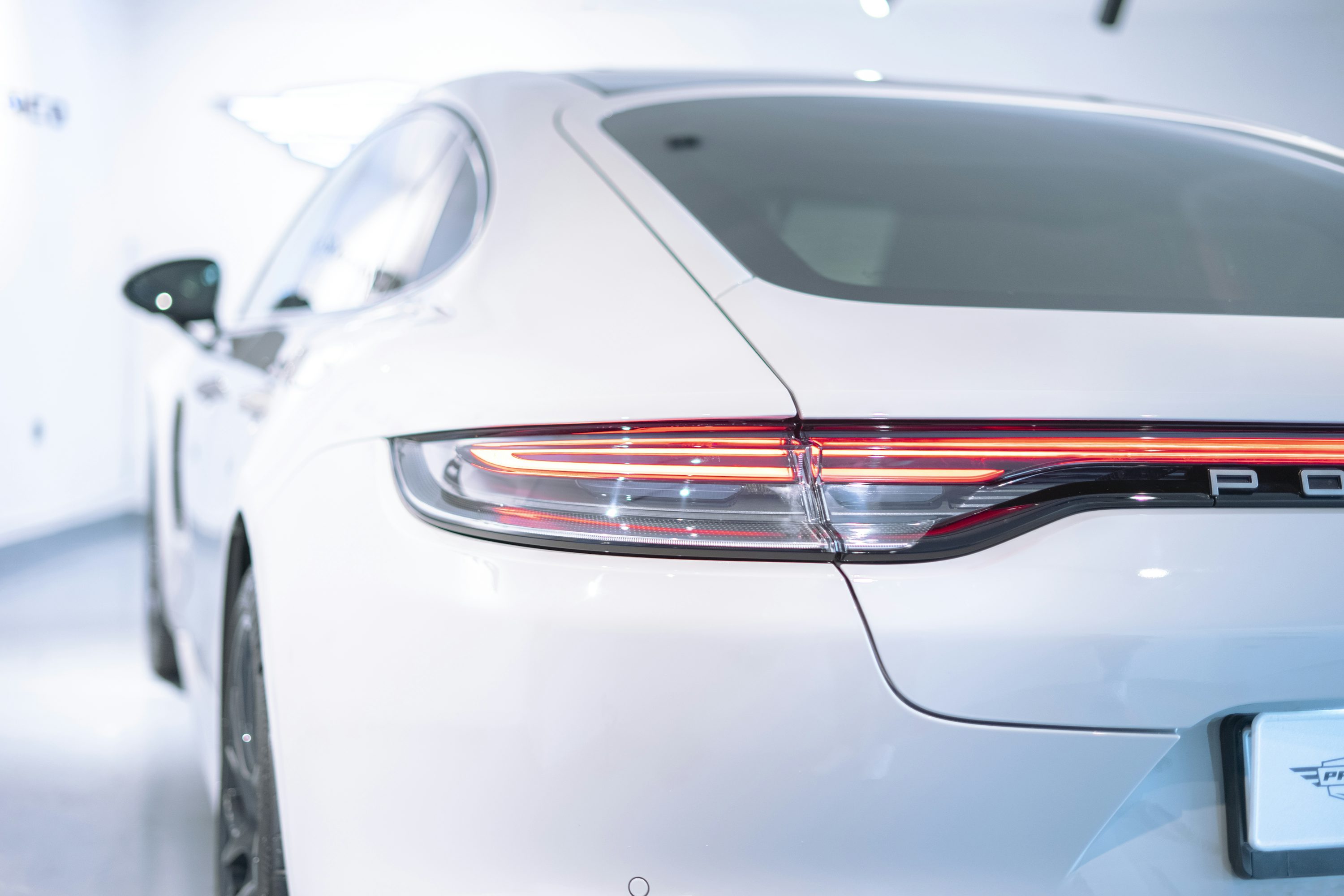 a white car with a red light