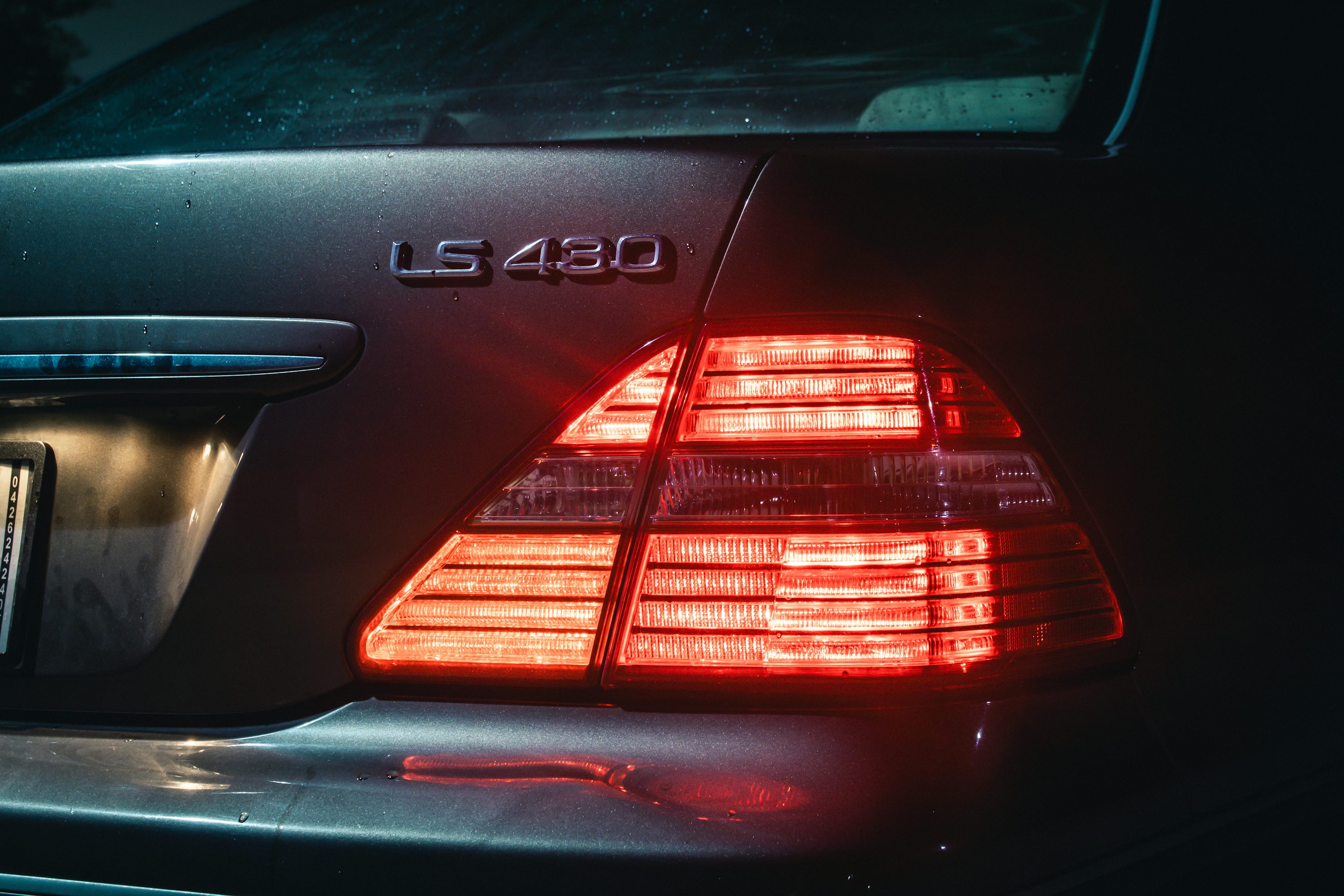 a close up of the tail lights of a car