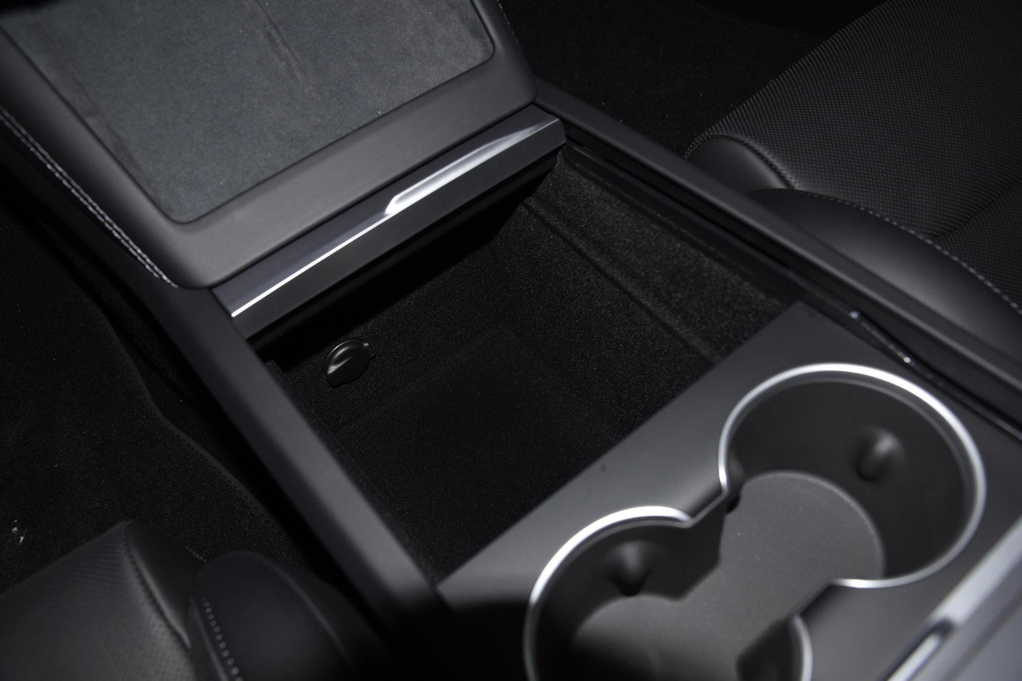 the 19th interior image of Tesla Model 3.