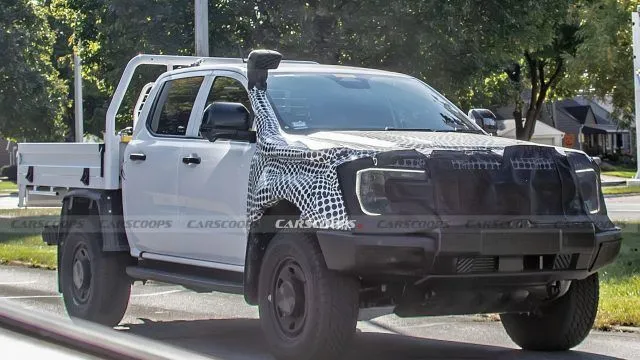 The upcoming 2026 Ford Ranger Super Duty has been spotted in the US, showcasing its robust off-road capabilities and unique design.