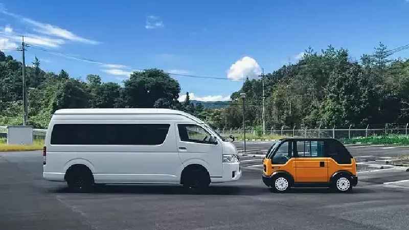 A compact, affordable Japanese electric car ideal for practical and economical urban mobility in crowded city environments.