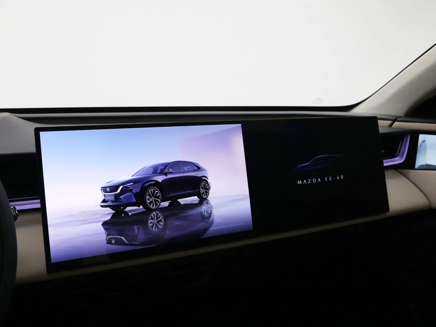 Mazda EZ-60 is a new all electric SUV with a sleek design, 5K display, and smart features, launching globally after receiving over 26,000 pre orders in China.