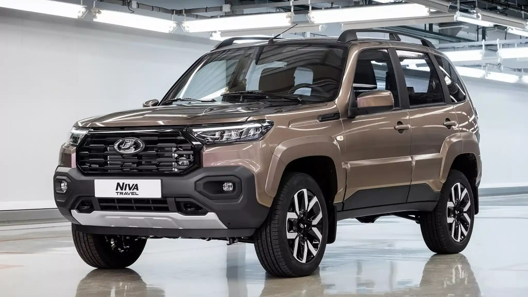 The 2025 Lada Niva Travel features a refreshed exterior and new engine with slight power gain, maintaining its efficiency and rugged off-road capability.