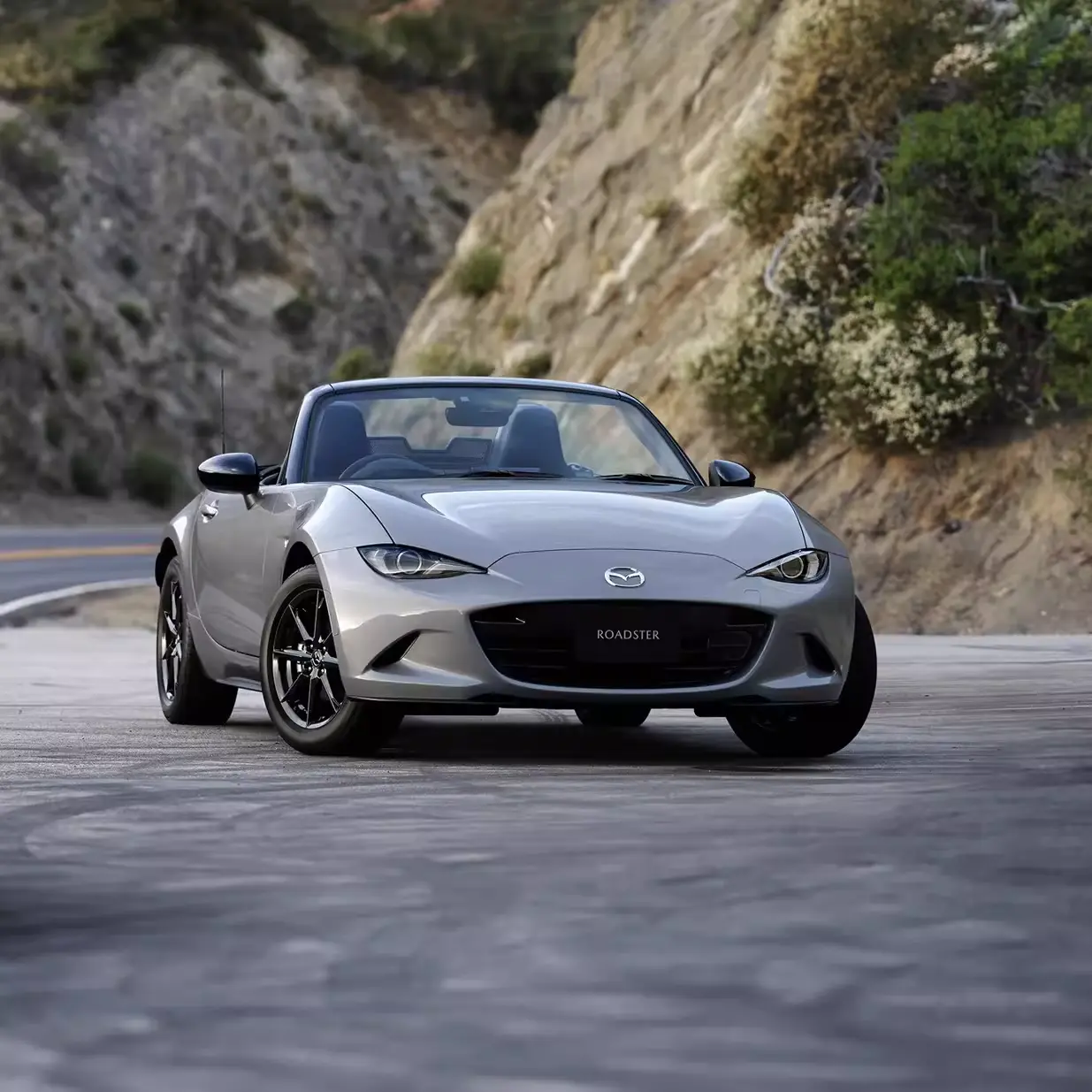 Mazda revives the RX-7 with a hybrid rotary sports car and develops a next gen MX-5, blending classic driving fun with modern tech for GCC car enthusiasts.