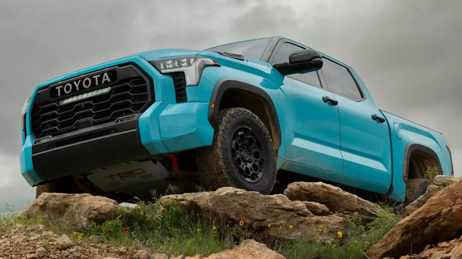 The 2026 Toyota Tundra offers enhanced luxury, new color options, improved seats, larger fuel tank, and advanced tow features. 