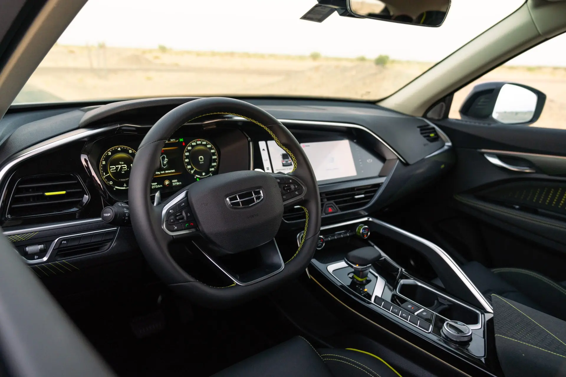 Discover the sporty and luxurious interior of the 2025 Geely Tugella in Saudi Arabia with digital screens, BOSE sound, premium seats, and smart comfort features