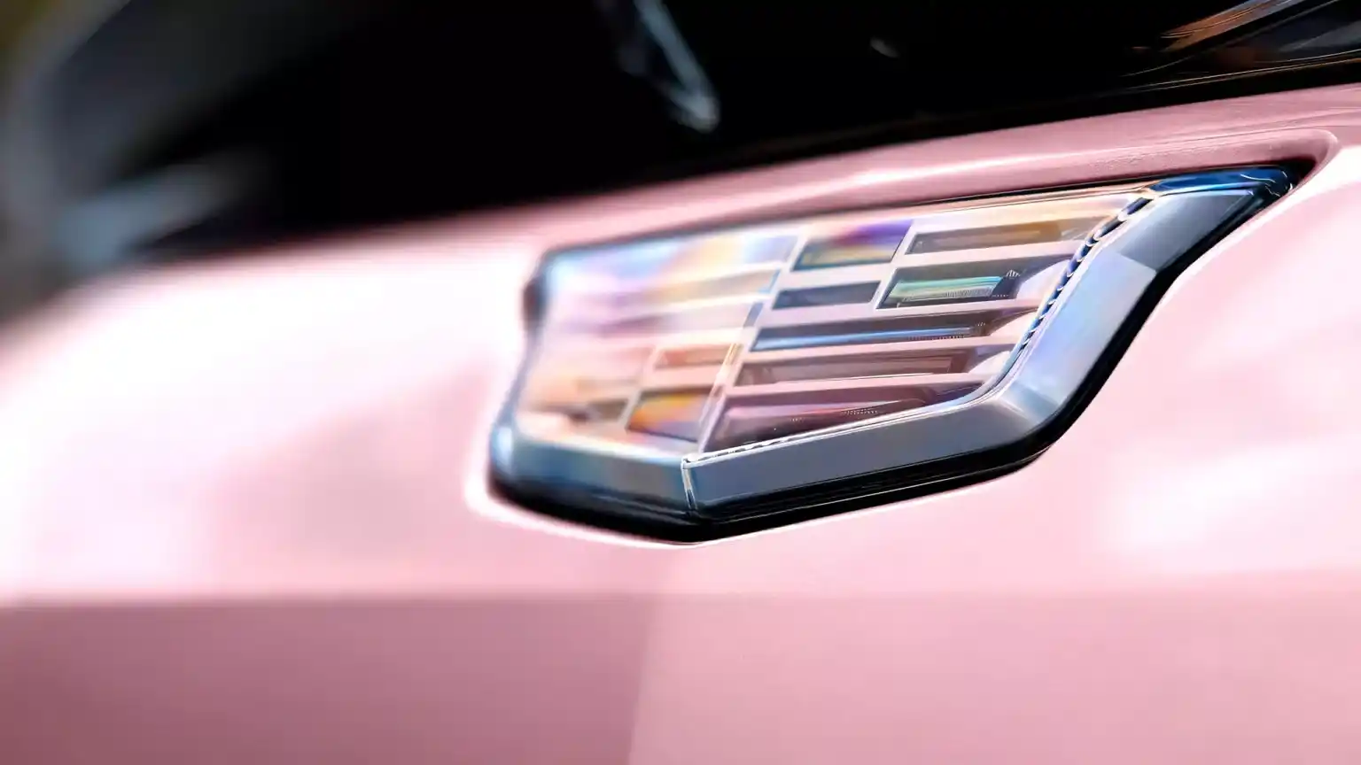 The pink electric Cadillac Optiq blends Mary Kay’s iconic legacy with environmental innovation, offering luxury design and advanced electric performance. 