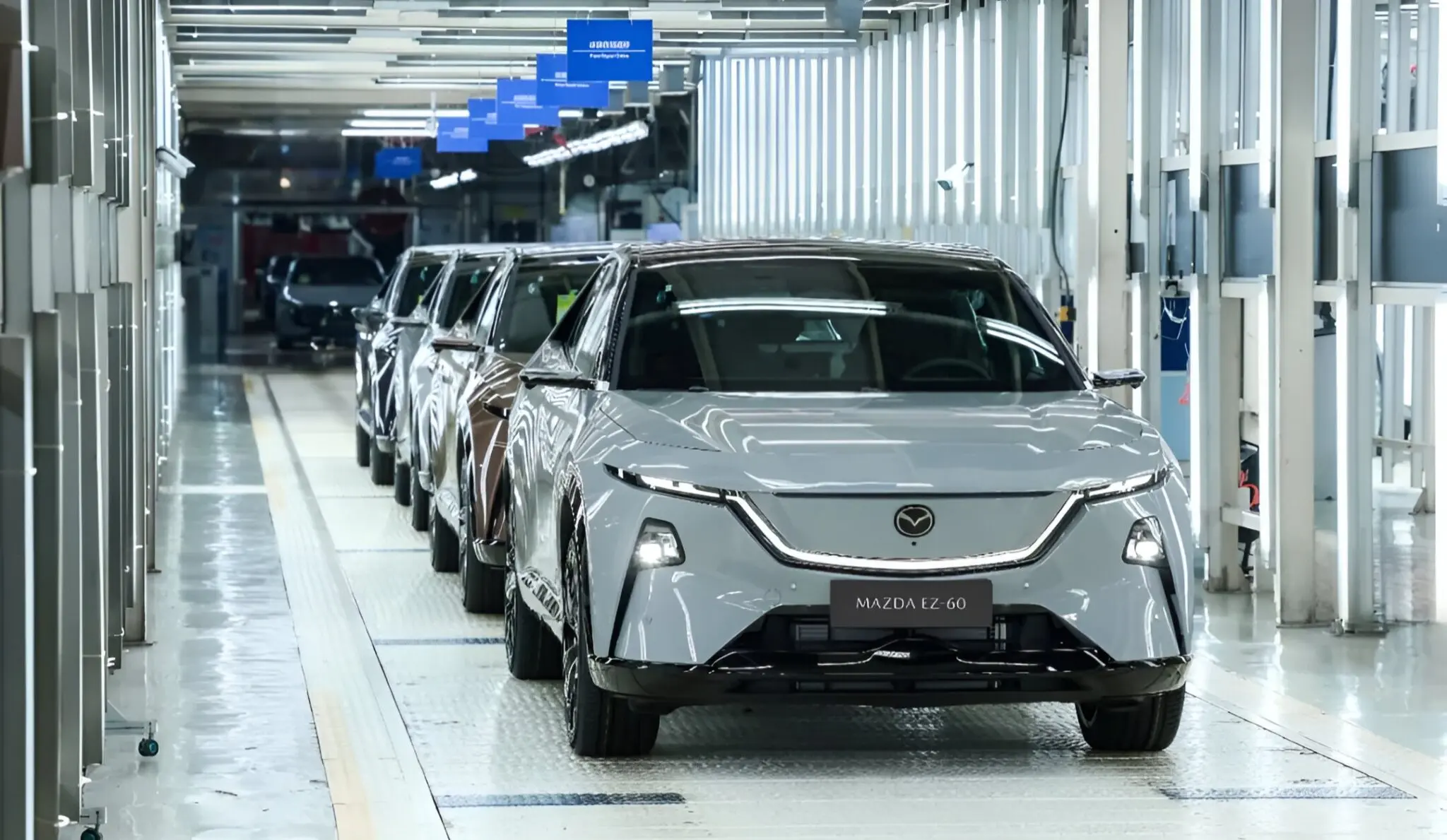 The Mazda EZ-60 enters production in China with over 38,000 reservations, a sleek aerodynamic design, smart cockpit tech, and global road testing completed.