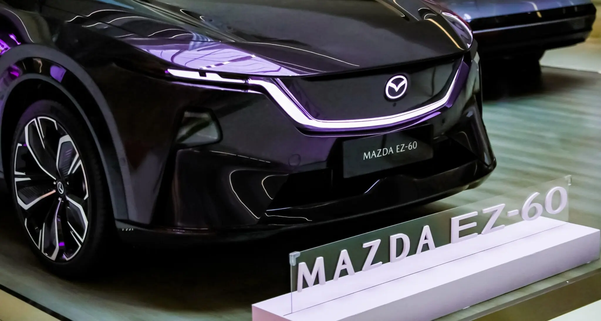 The Mazda EZ-60 enters production in China with over 38,000 reservations, a sleek aerodynamic design, smart cockpit tech, and global road testing completed.