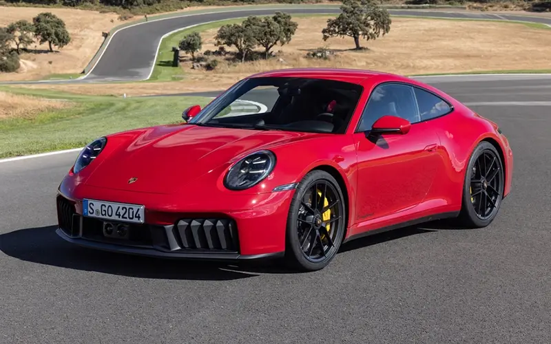 The 2025 Porsche 911 arrives with its first ever hybrid system, updated design, enhanced performance, and prices starting from 588,500 SAR in Saudi Arabia.