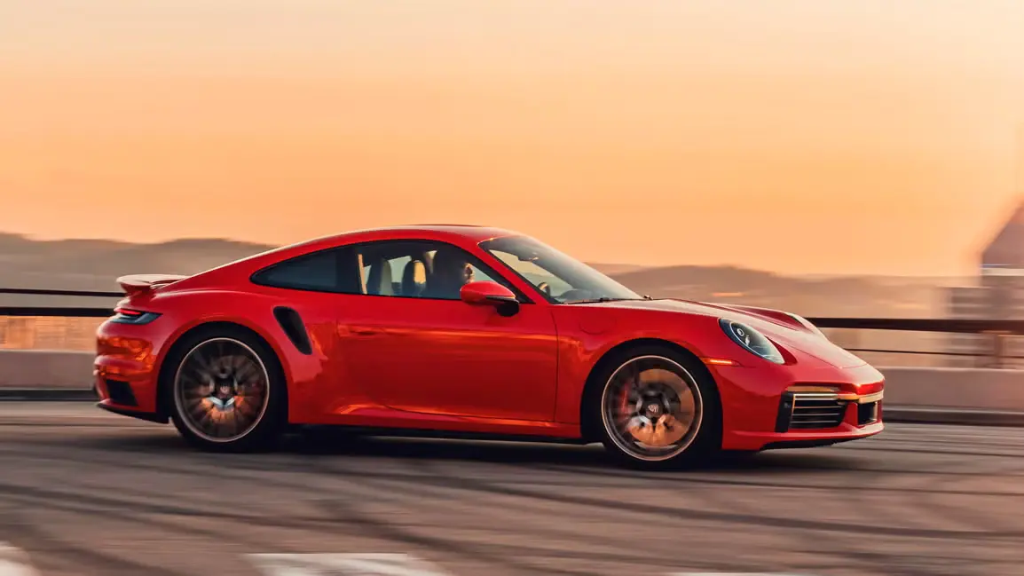 The 2025 Porsche 911 arrives with its first ever hybrid system, updated design, enhanced performance, and prices starting from 588,500 SAR in Saudi Arabia.