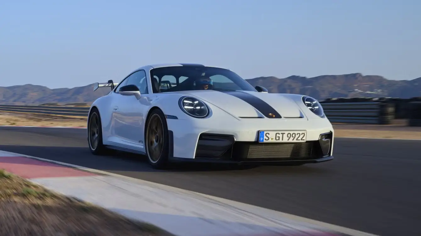 The 2025 Porsche 911 arrives with its first ever hybrid system, updated design, enhanced performance, and prices starting from 588,500 SAR in Saudi Arabia.