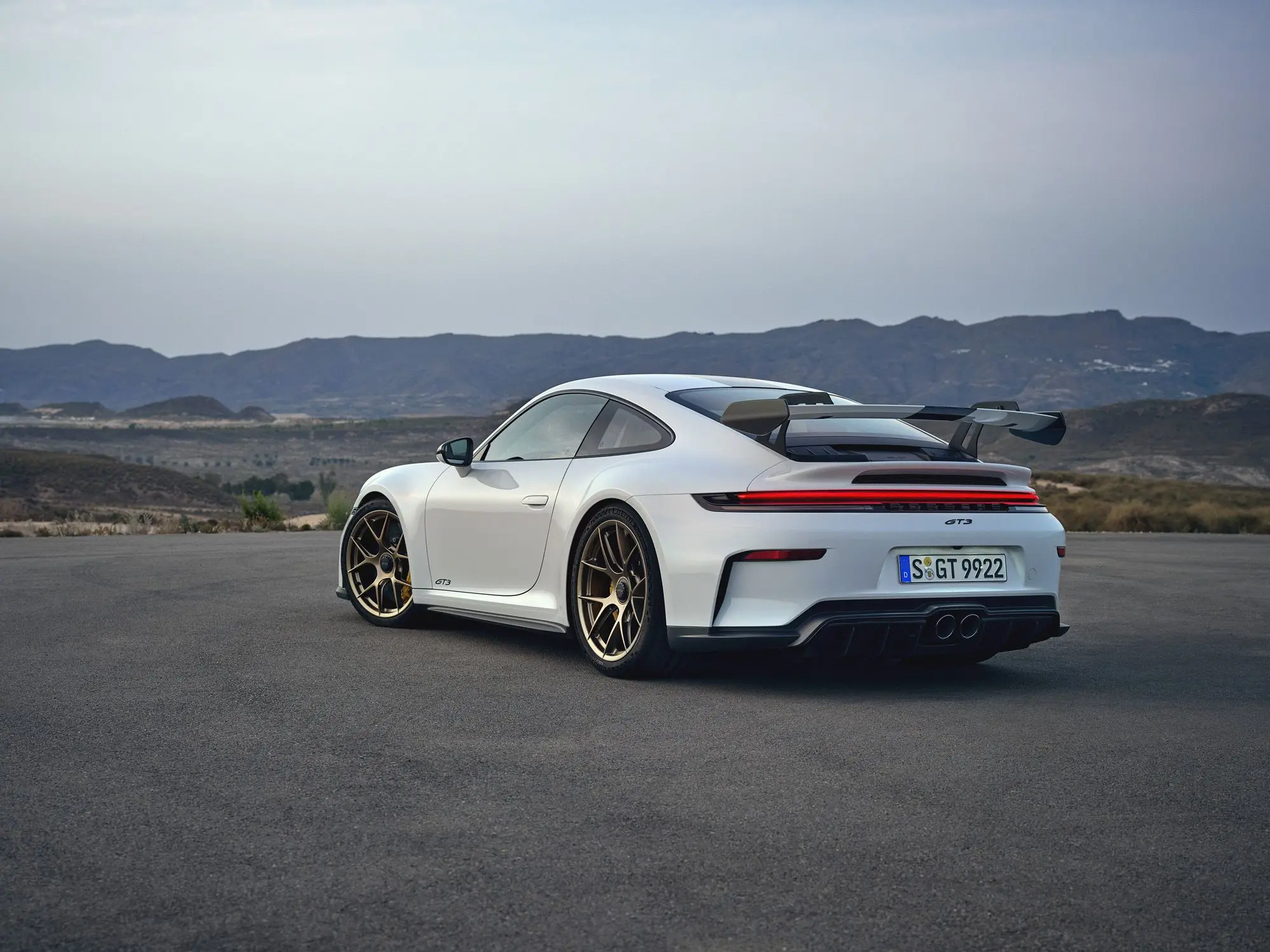 The 2025 Porsche 911 arrives with its first ever hybrid system, updated design, enhanced performance, and prices starting from 588,500 SAR in Saudi Arabia.