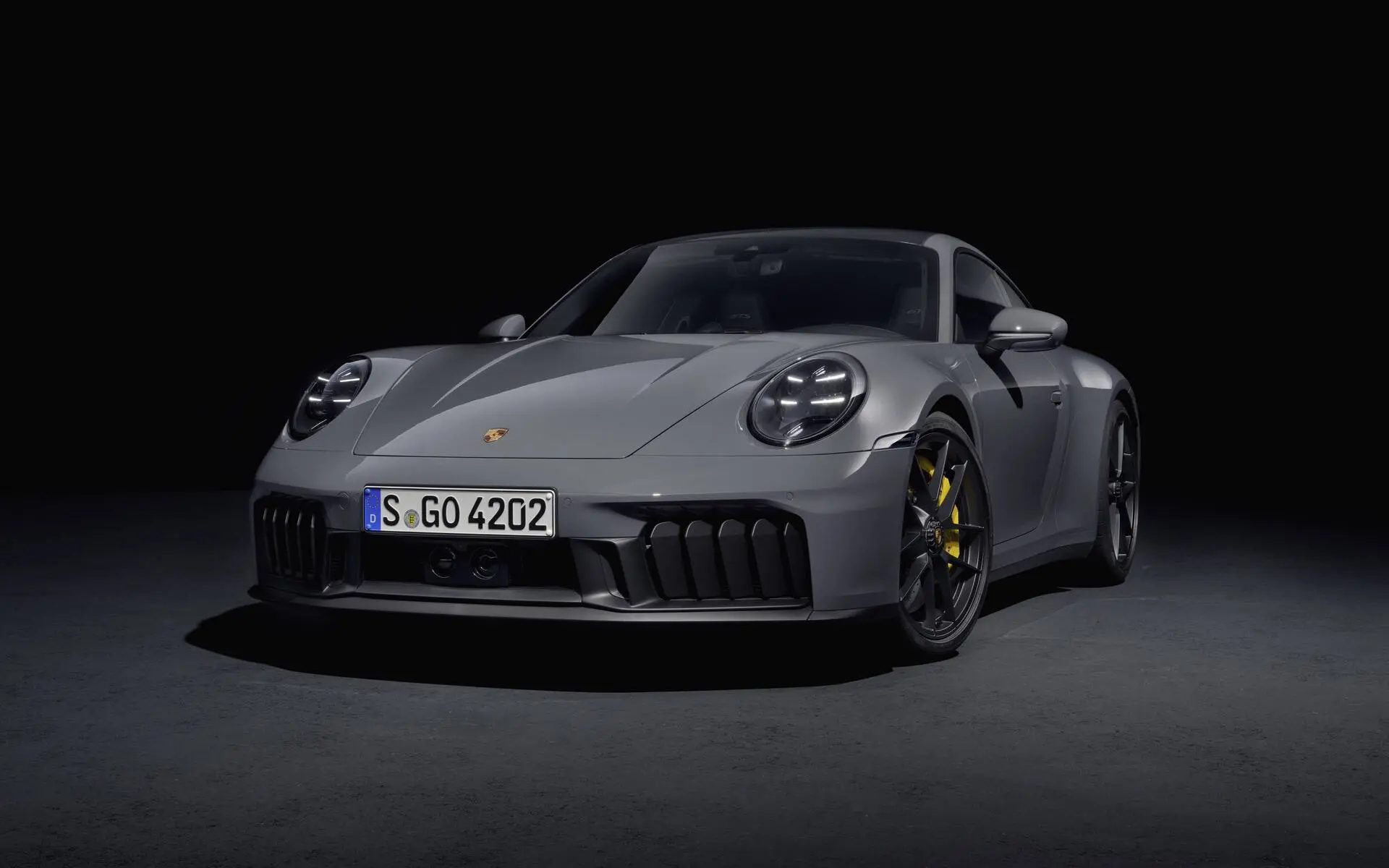 The 2025 Porsche 911 arrives with its first ever hybrid system, updated design, enhanced performance, and prices starting from 588,500 SAR in Saudi Arabia.