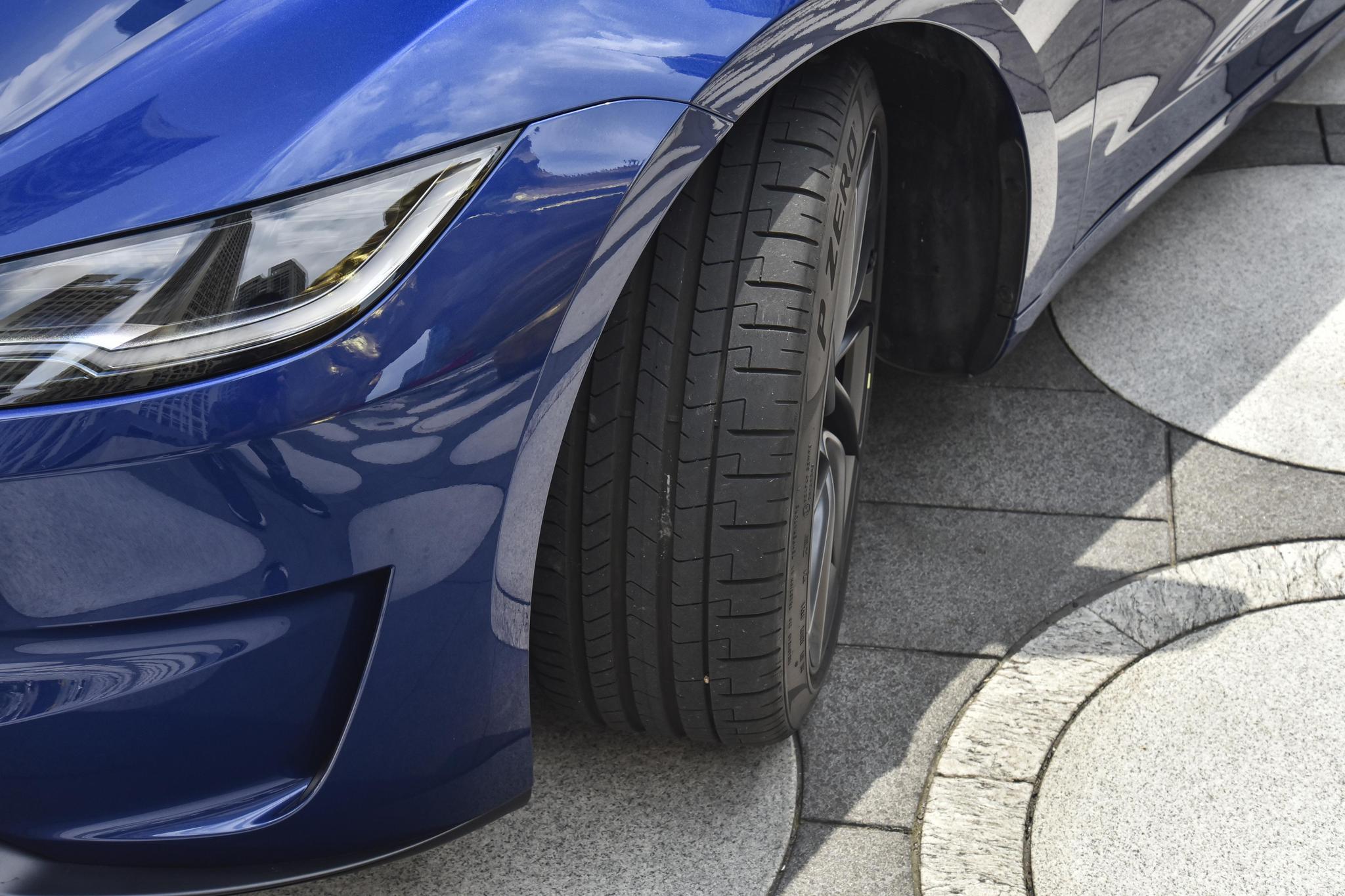 the 11th exterior image of Tesla Model 3.